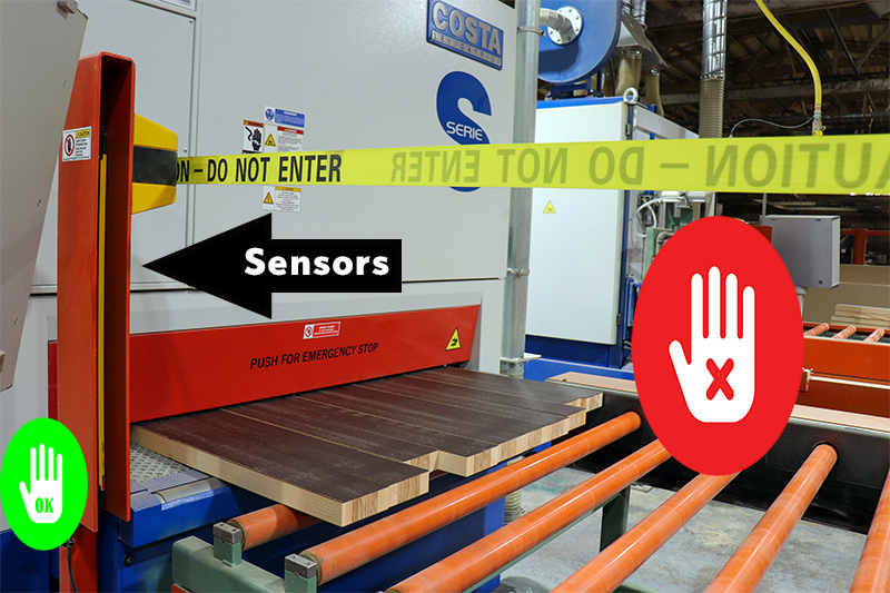 The safety light curtain automatically shuts down the belt if a body part or object crosses in front of an array of photoelectric sensors.